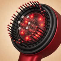 Detalle del cabezal con luz roja LED del cepillo masajeador